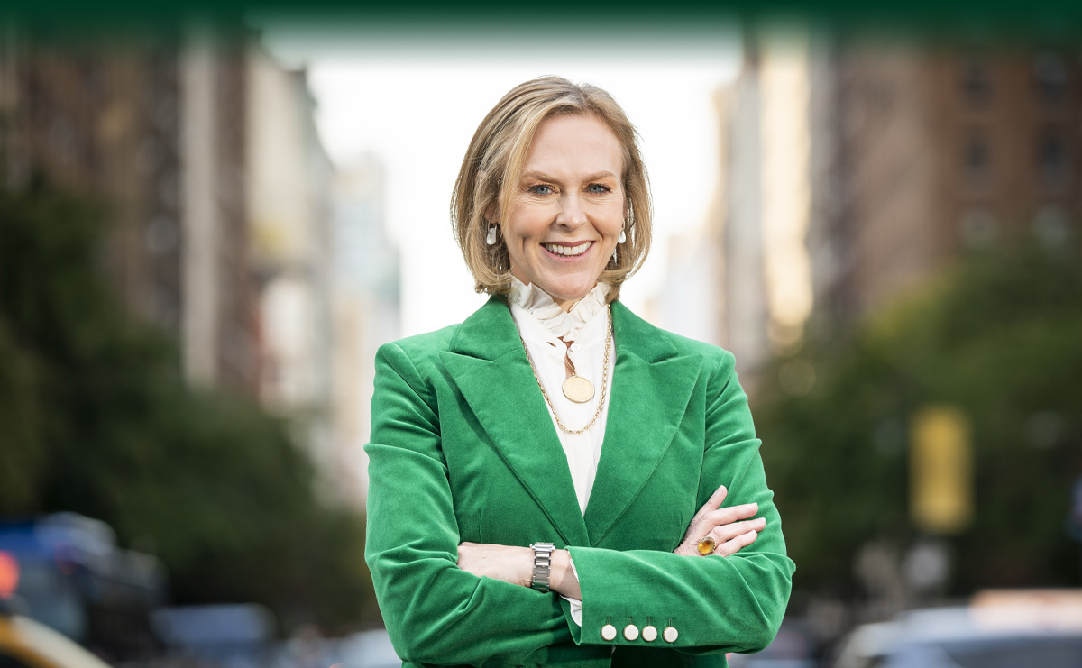 Debbie Epstein in a green suit jacket