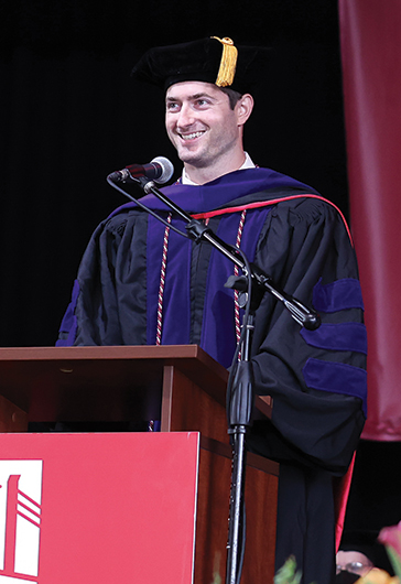 Graduate giving a speech